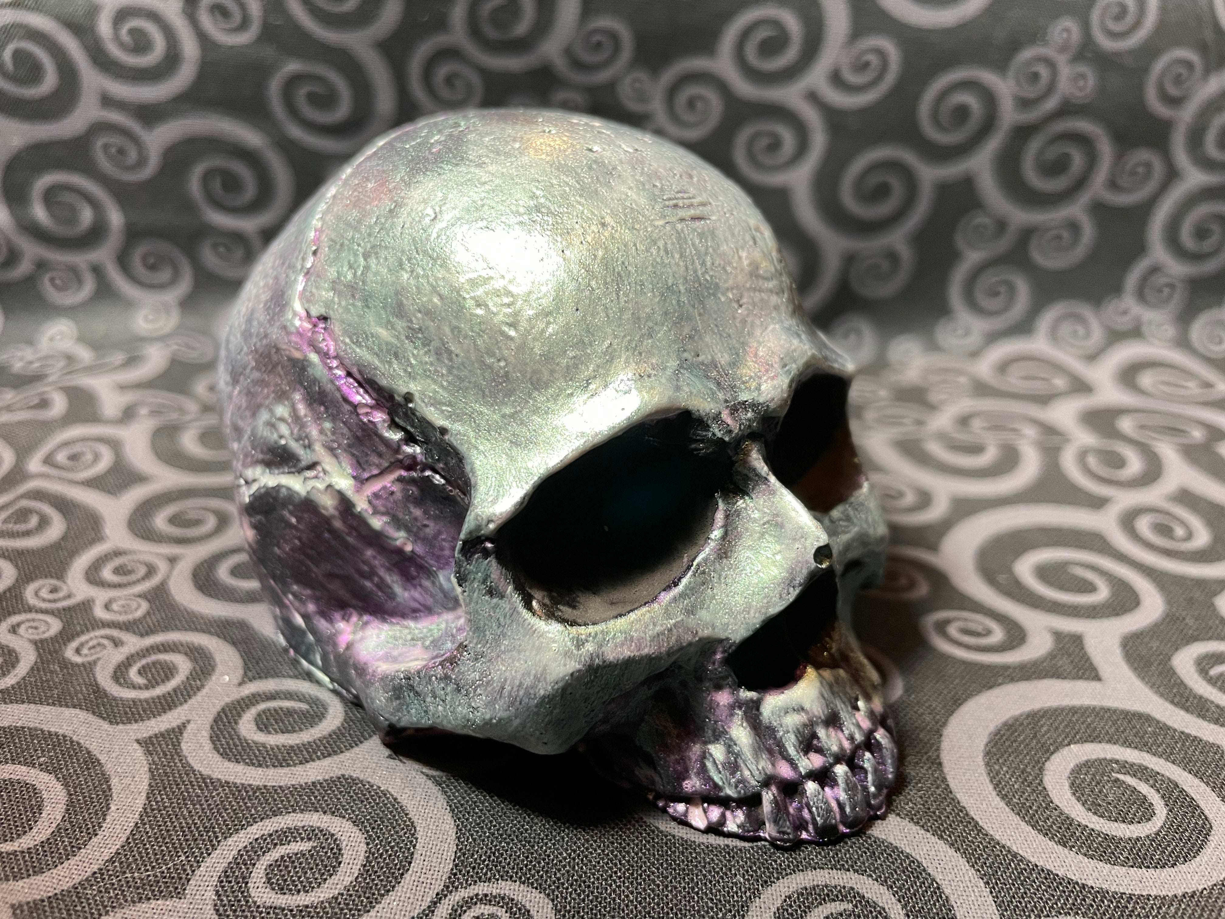 Green and purple half skull