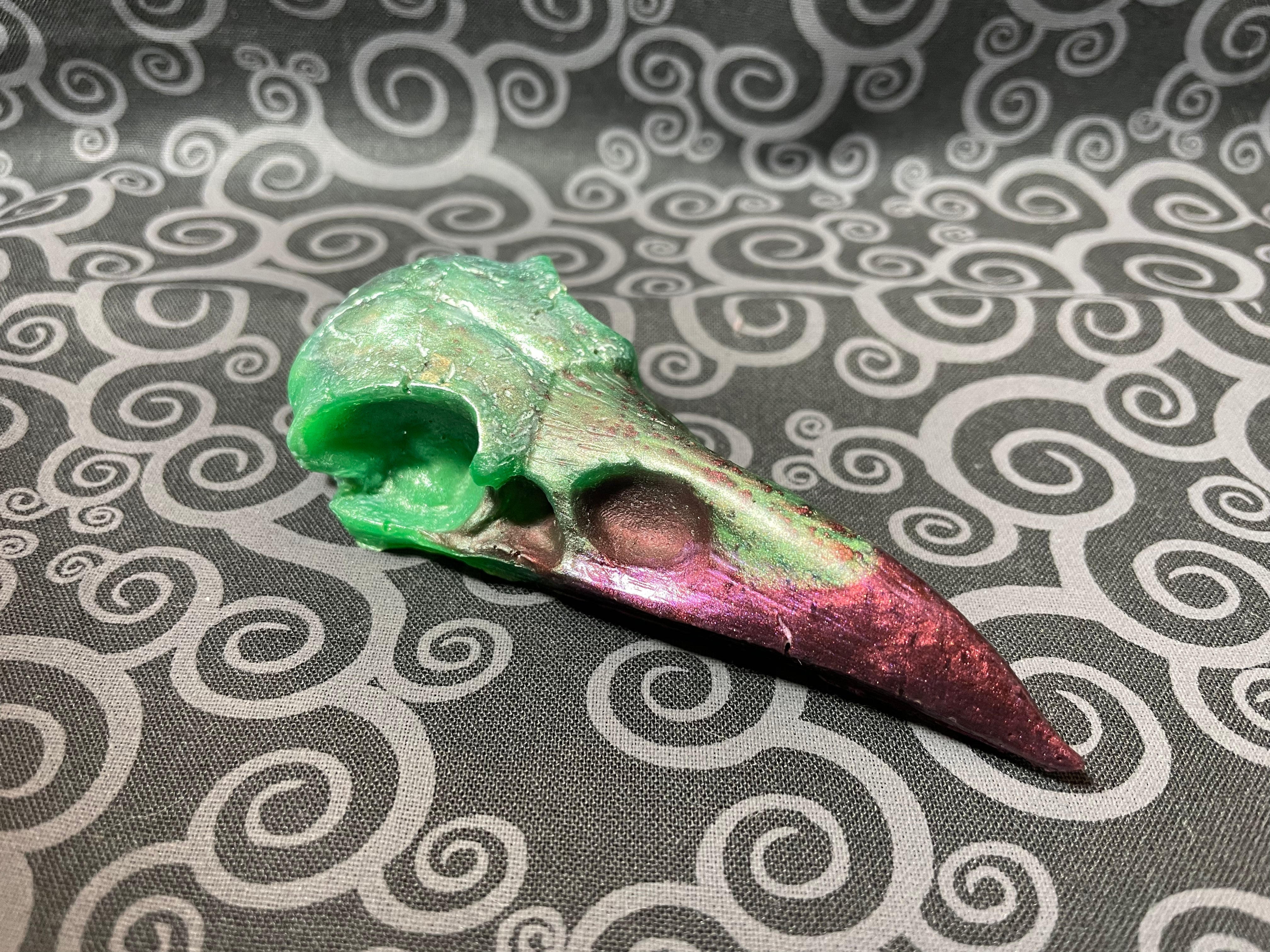 Green and purple crow skull