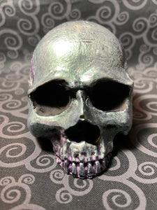 Green and purple half skull